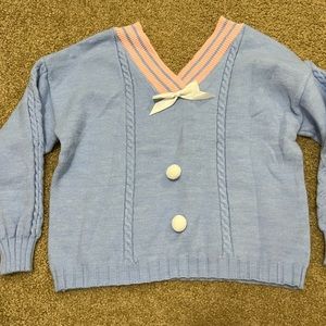 V neck pom pom sweater